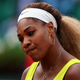Serena Williams reacts during her women’s-singles match against Garbine Muguruza of Spain at the French Open May 28, 2014.
Clive Brunskill/Getty Images